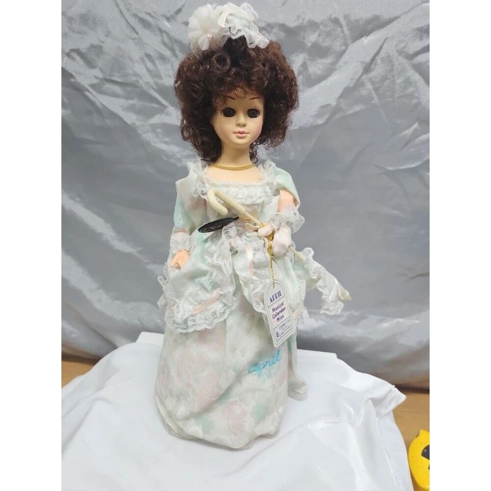 April musical doll plays rain drops by brinn 1988